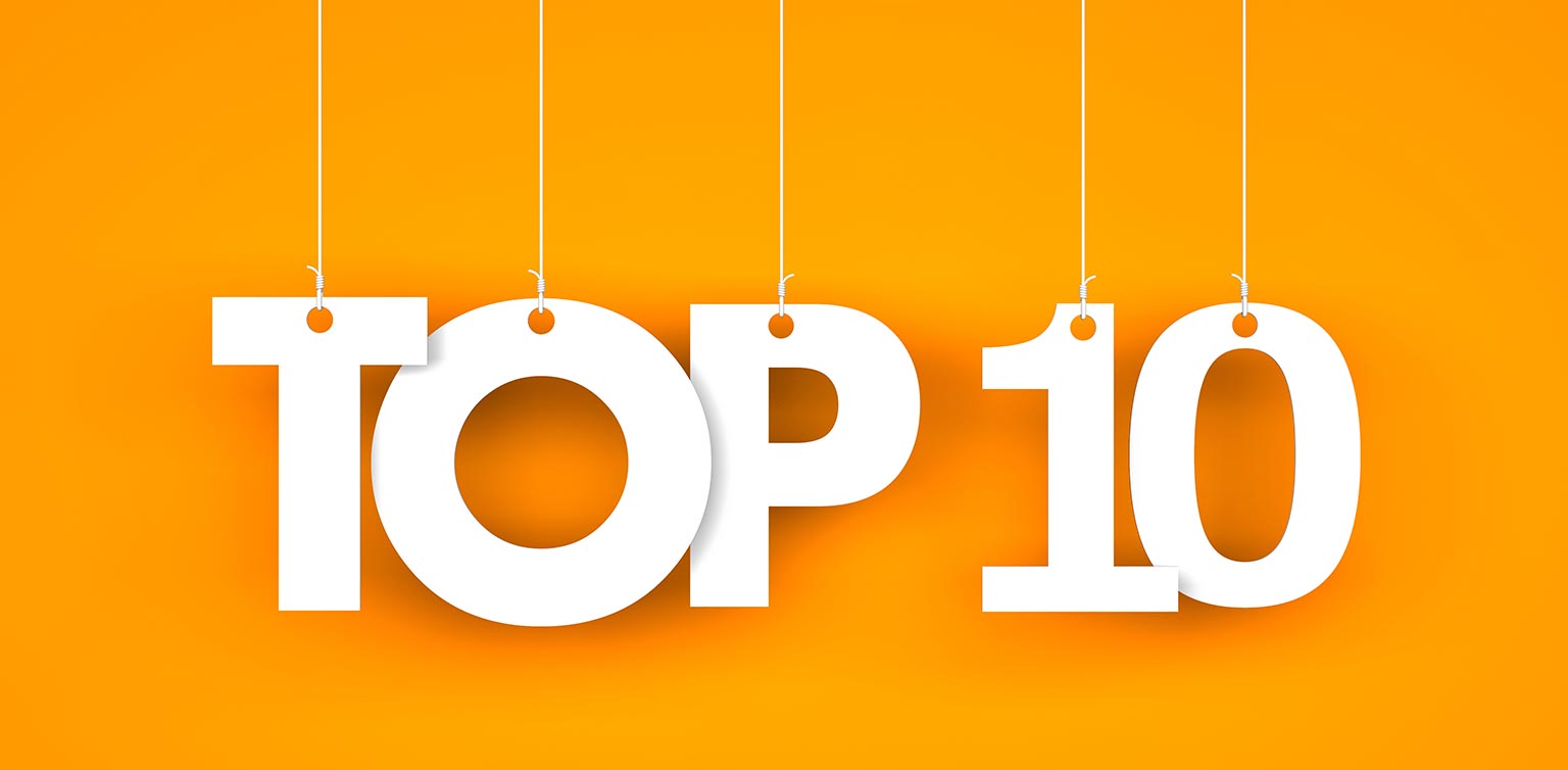 An illustration of hanging white letters spelling 'Top 10' on an orange background