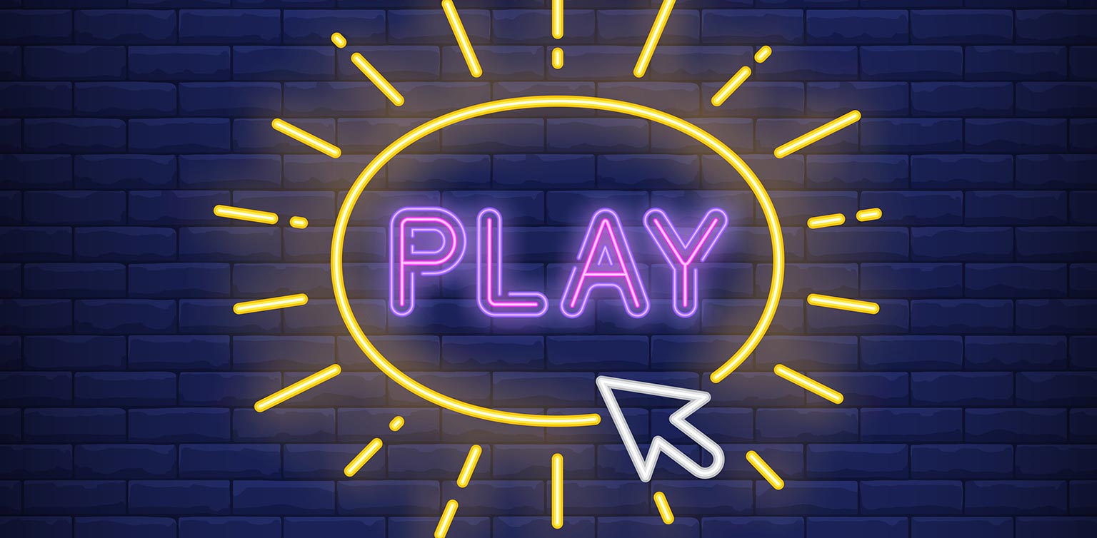 An illustration of a neon sign featuring the word ‘Play’ and a mouse cursor against a dark blue brick layered wall  